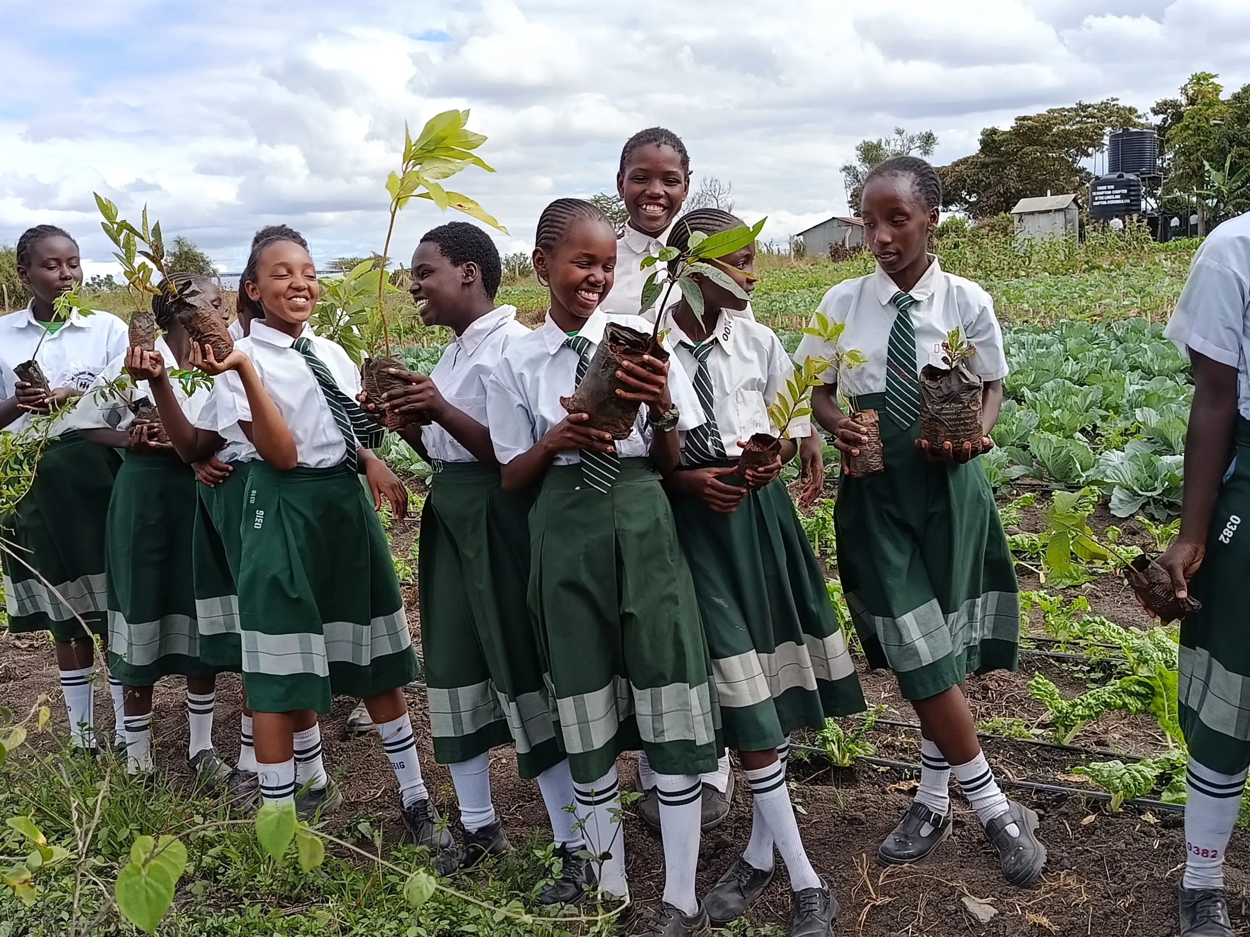 School community in Kenya with newly planted fruit trees