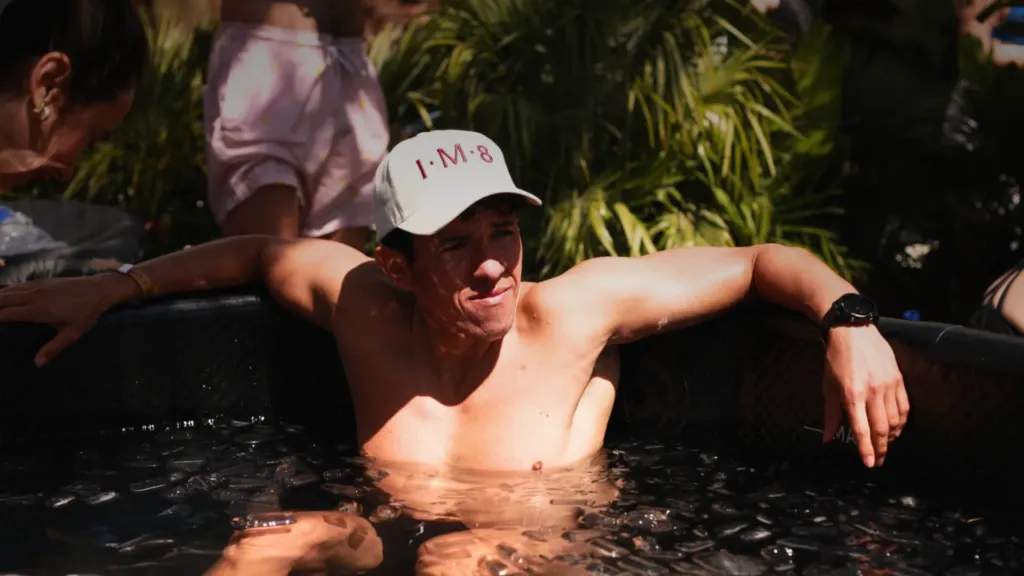 Man in an ice bath at Wellness Rave, calm inside the cold, a cold exposure nervous system reset